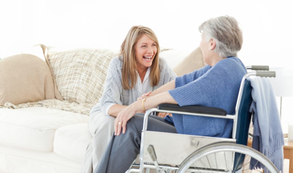 Adult Child with Senior in Wheelchair